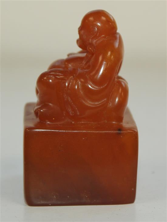 A Chinese Tianhuang stone Budai seal, 173g., 6.5 x 4 x 4cm